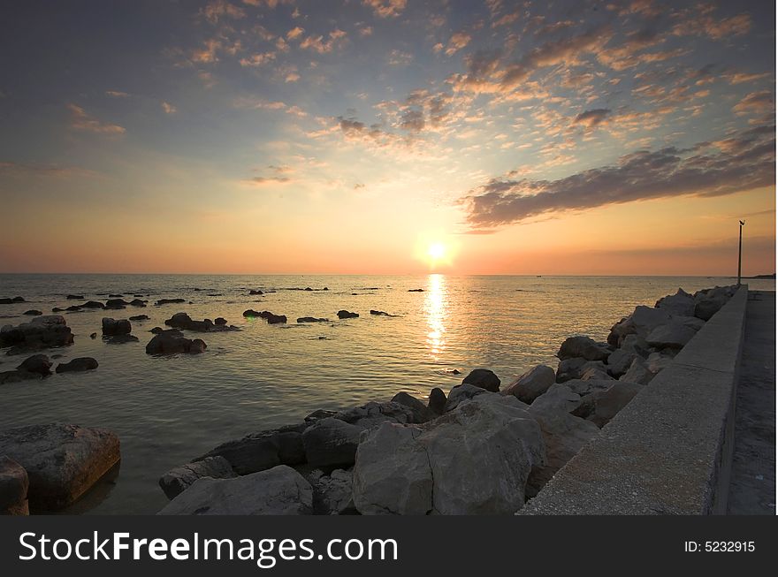 Rocky croatian beach in the area of Umag, Adriatic sea. Rocky croatian beach in the area of Umag, Adriatic sea