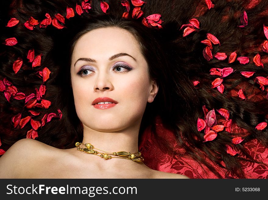 Beautiful Woman In Red Petals