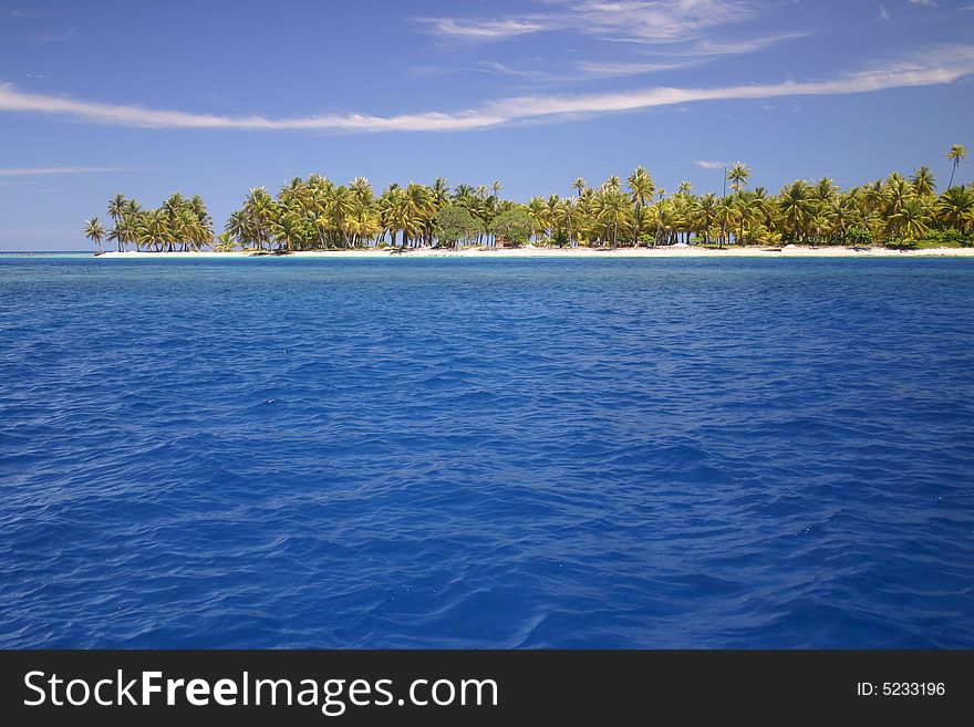 Secluded sandy beach on famous travel destination Atoll Rangiroa. French Polynesia. Secluded sandy beach on famous travel destination Atoll Rangiroa. French Polynesia