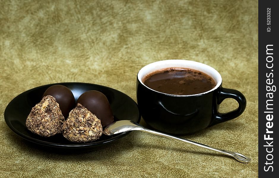 Sweets with cup of coffee