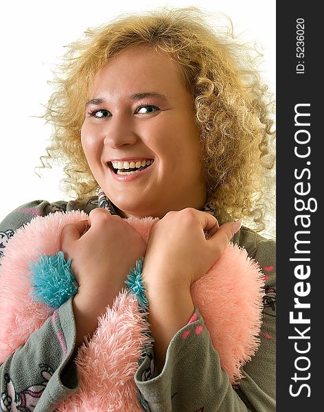 Young woman with pink pillow on white. Young woman with pink pillow on white