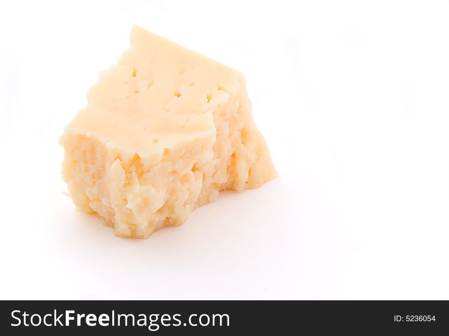 Piece of cheese on white background. Piece of cheese on white background