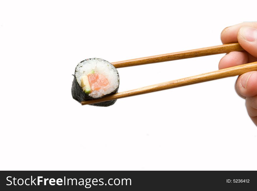 Salmon roll with avocado in soy isolated om white. Salmon roll with avocado in soy isolated om white