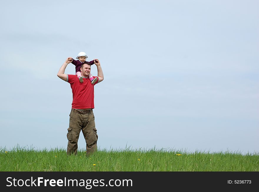 Father and baby girl on sky background. Father and baby girl on sky background