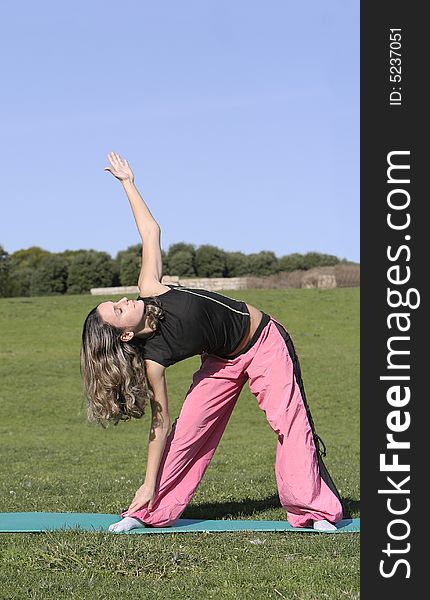 Woman stretching in the park