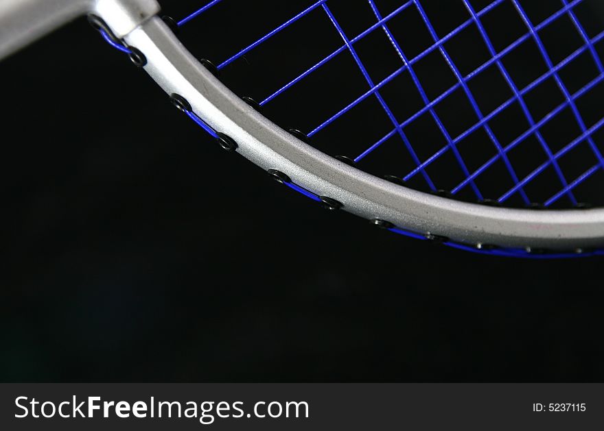 Partial view of a badminton racquet