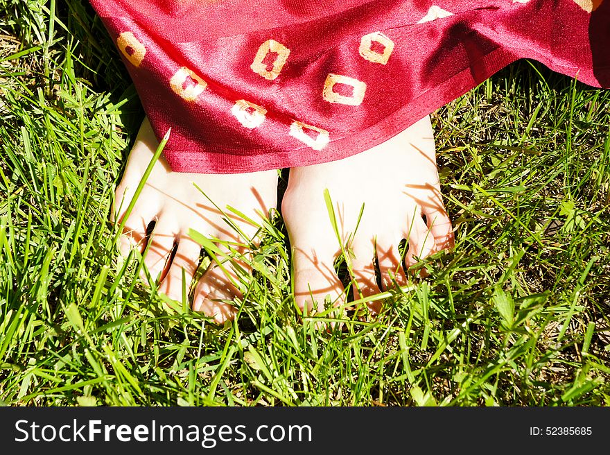 Barefoot Girl On Grass