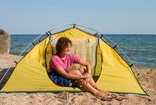 Smyling Girl Sitting In The Tent At Sea Coast Stock Photography Smyling Girl Sitting In The Tent At Sea Coast Stock Photography