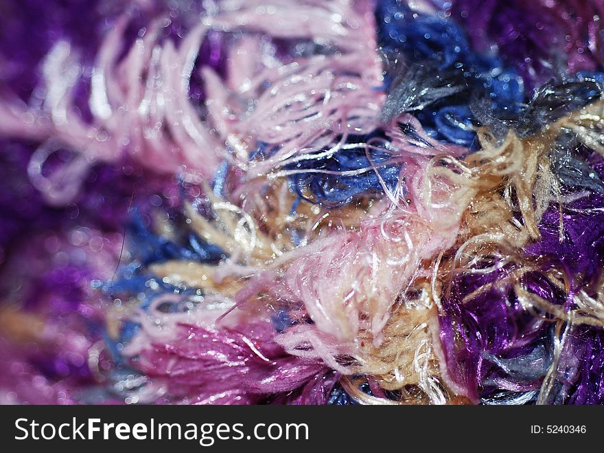 A macro photograph of threads and fibers. A macro photograph of threads and fibers