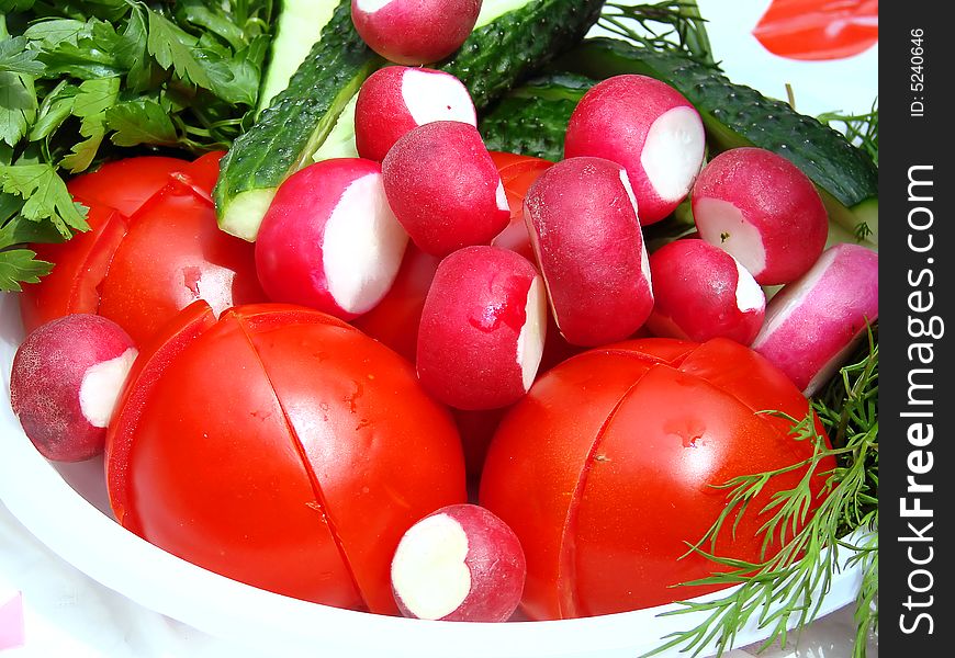 Fresh vegetables assorted on the white plate