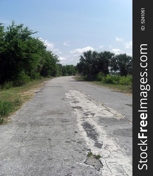 An old, broken and deserted road. An old, broken and deserted road