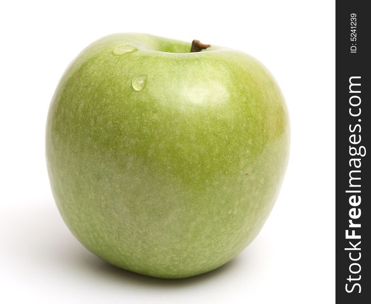 Green Apple Over White Background