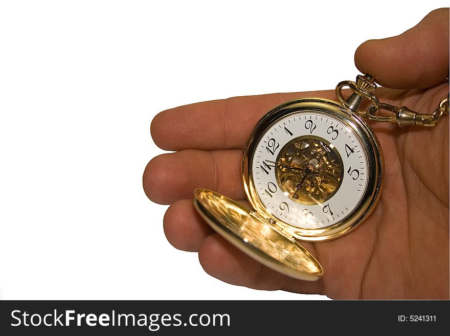 Clock in a hand on a white background. Clock in a hand on a white background