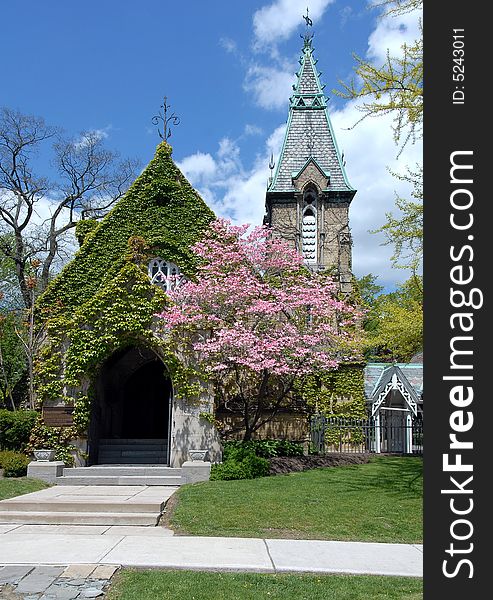 A Victorian chapel at a cemetery, looking very pretty on a sunny spring day. A Victorian chapel at a cemetery, looking very pretty on a sunny spring day.