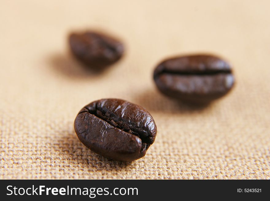 Closeup of three coffee beans