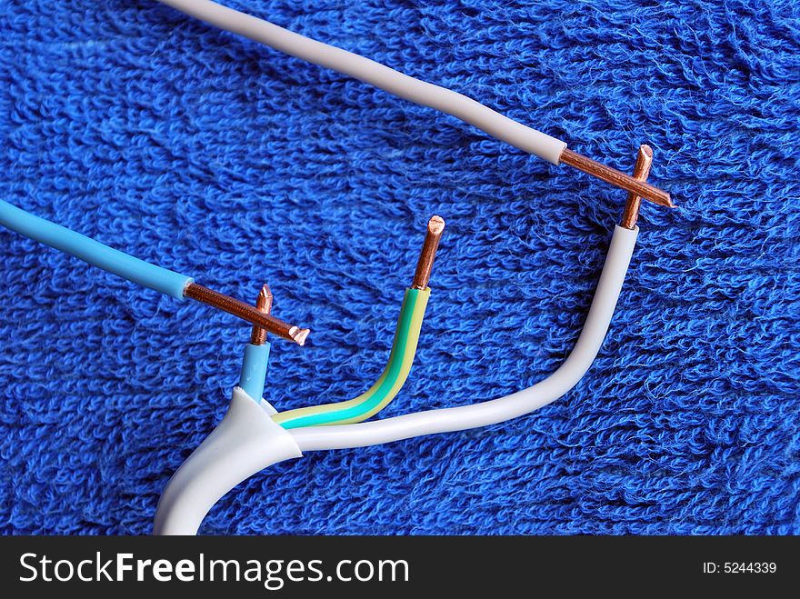 Electrical cable on blue background