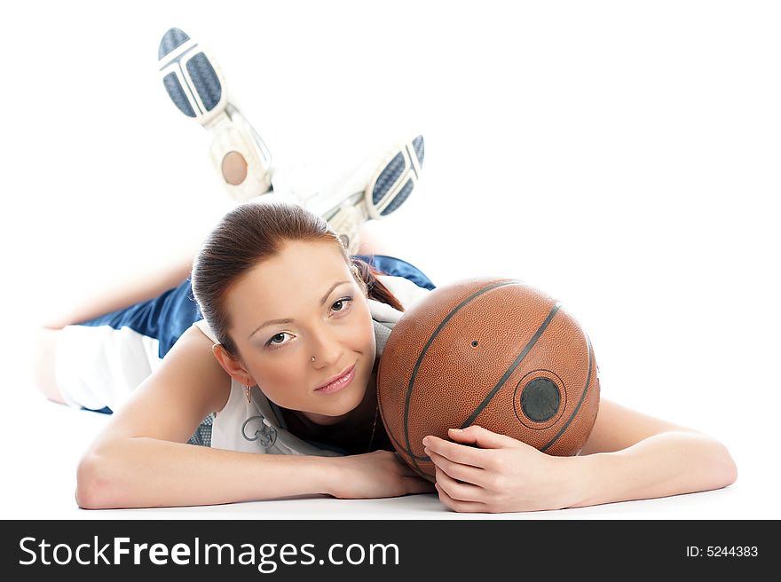 Young beautiful female basket ball player
