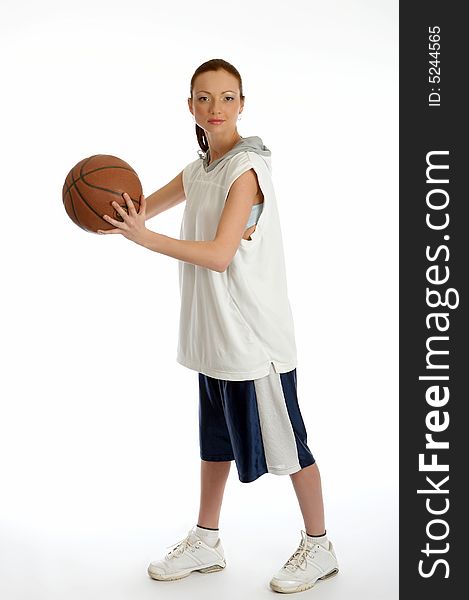 Young beautiful female basket ball player