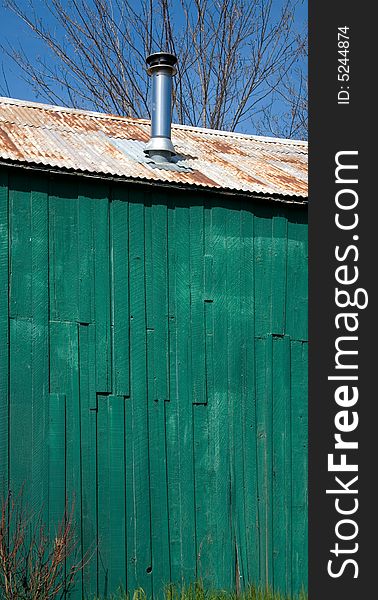 Wooden Wall of Farmhouse painted Gree, the traditional color for California Barns. Wooden Wall of Farmhouse painted Gree, the traditional color for California Barns