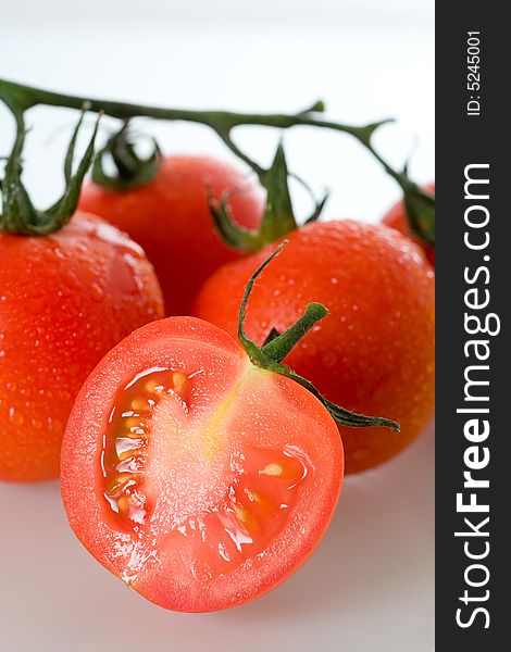 Fresh tomatoes, isolated on white