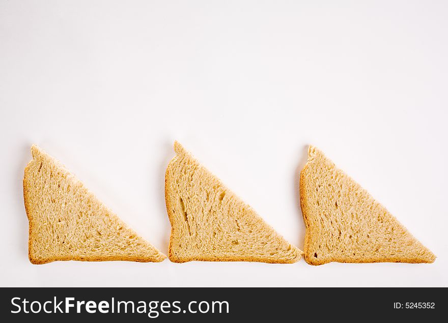 Sliced bread background, isolated on white