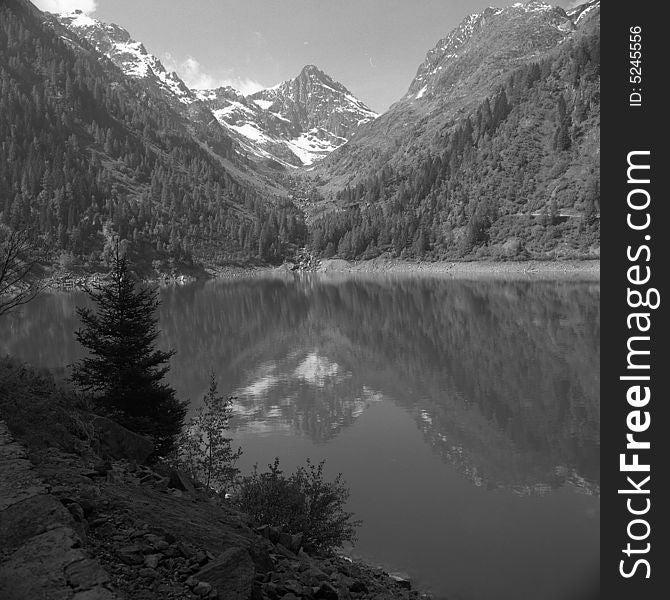 A mountain reflected on water