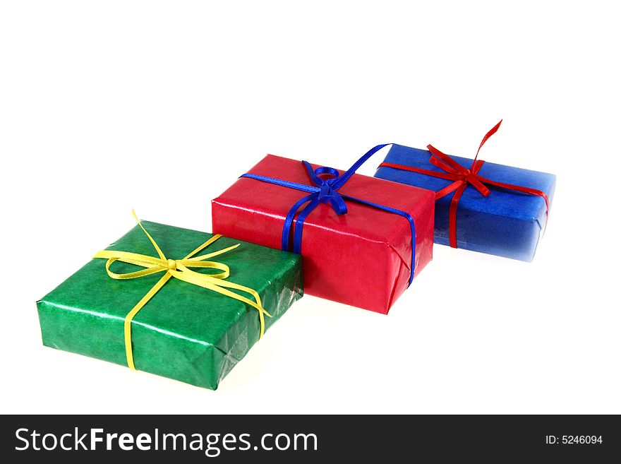 Some colored gift boxes on white background