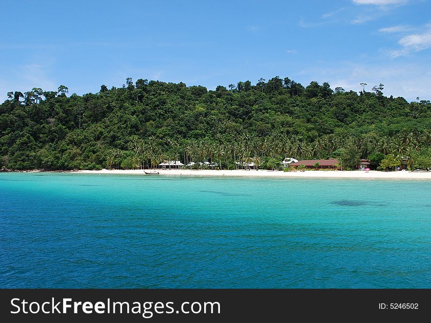 Pristine beach and clear blue sky