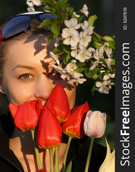 The Girl With A Bouquet Of Tulips