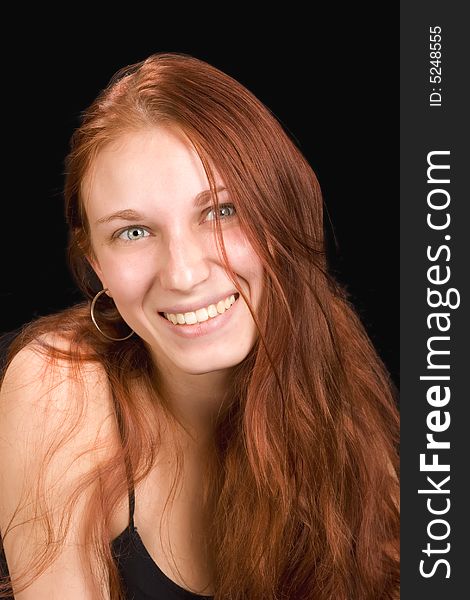 Beautiful smiling redhead with blue eyes