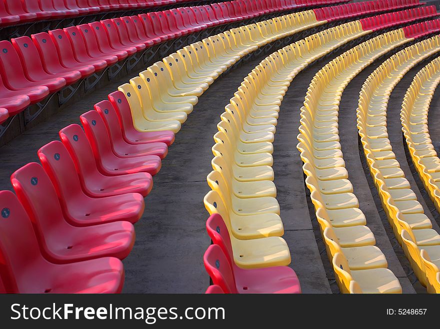 These chairs are  color.red and yellow. These chairs are  color.red and yellow.