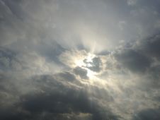 Sun Behind Clouds. Royalty Free Stock Photo