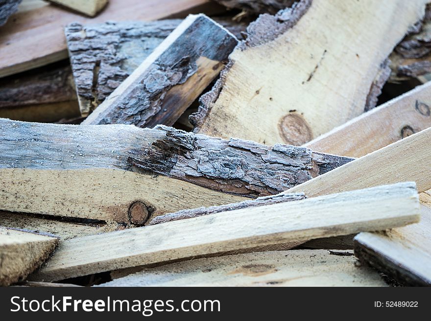 Heap of wood covered with frost. Heap of wood covered with frost.