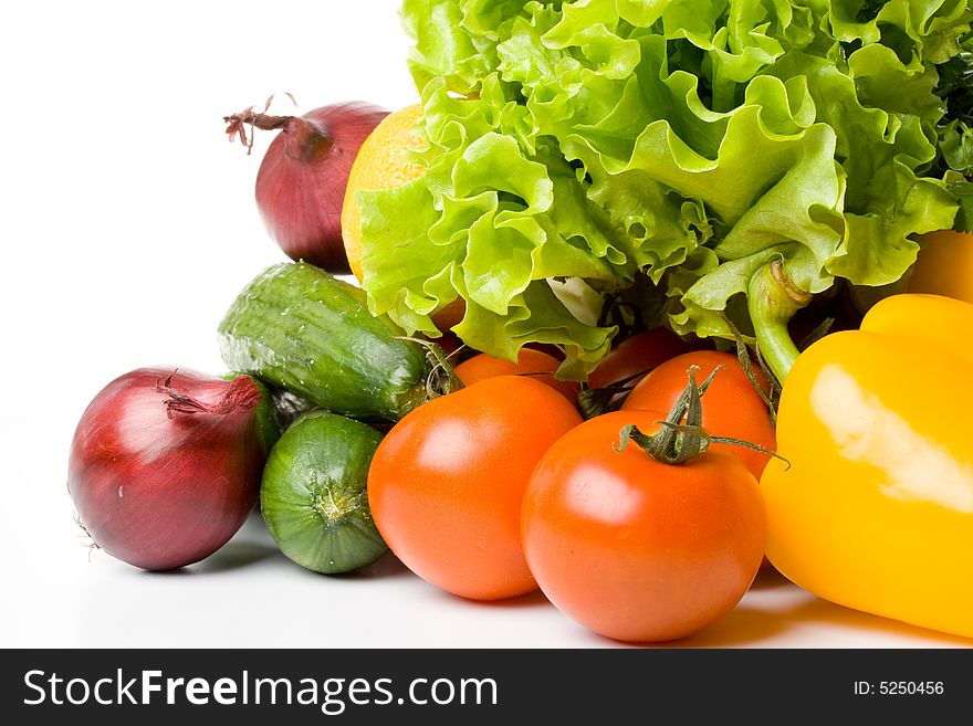 Fresh vegetables on a white background. Close up.