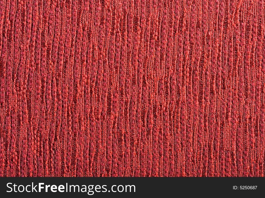 Qualitative red fabric texture. Abctract background. Close up.