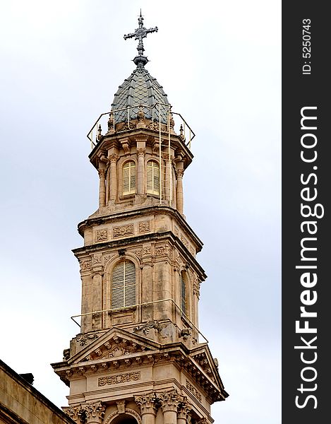 A tall tower in a catholic church. A tall tower in a catholic church