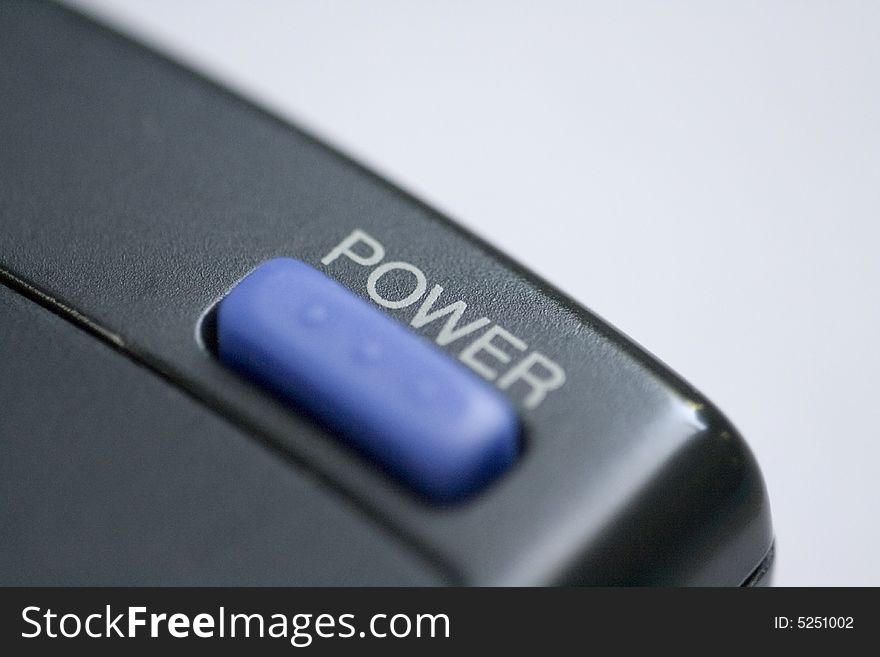 Close up of a power button on a remote control