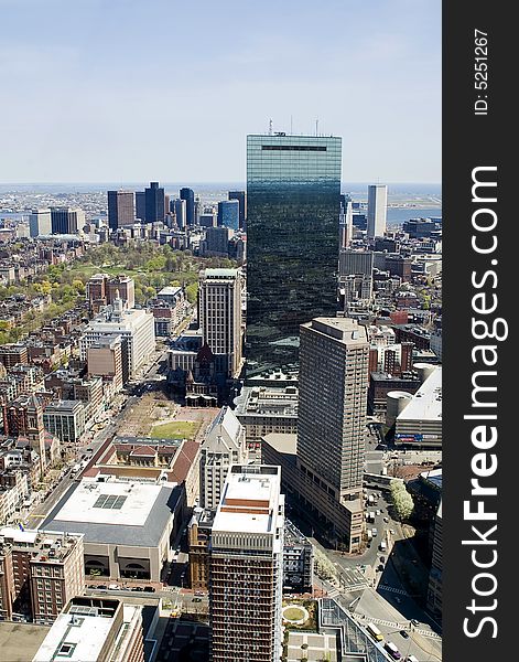 Boston skyline picture at midday with blue sky taken from the Prudential tower. Boston skyline picture at midday with blue sky taken from the Prudential tower