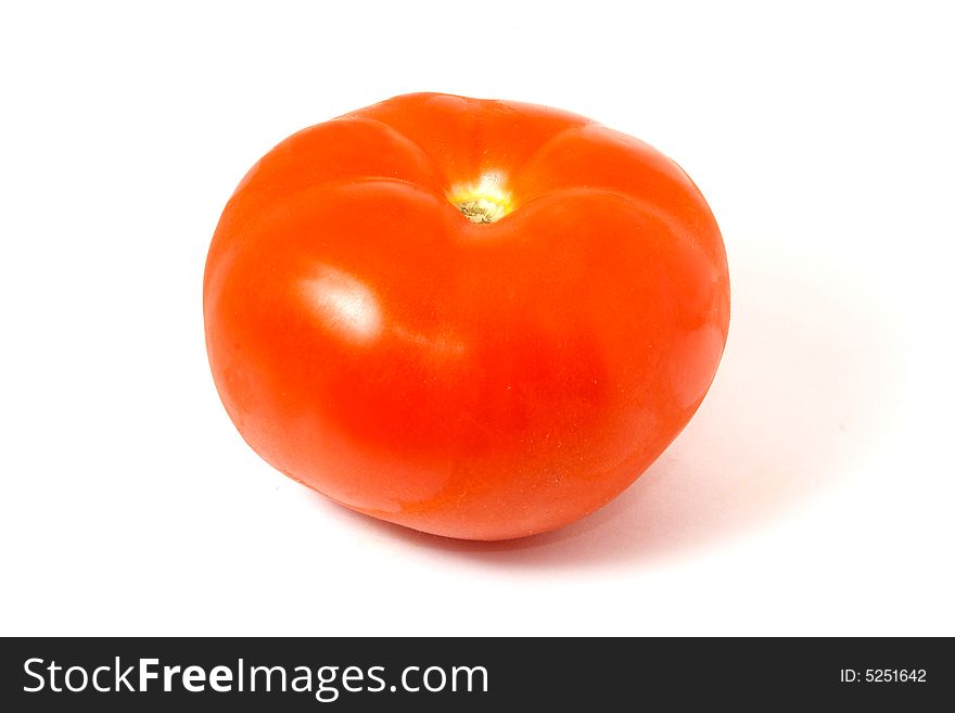 Photo of the tomato in the isolate. Photo of the tomato in the isolate