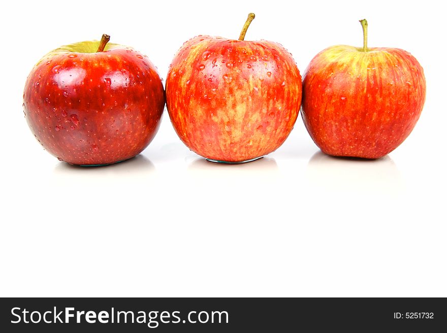 Red apples isolated against a white background