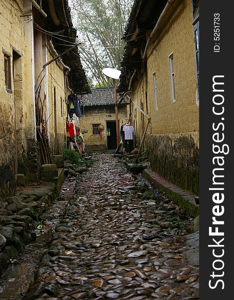 Road made by cobble in the alley,at south of China country. Road made by cobble in the alley,at south of China country.