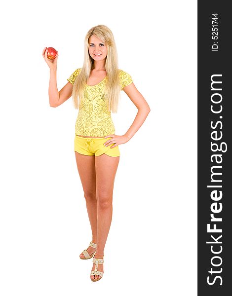Long haired and long legs blond sportive girl with an apple. Long haired and long legs blond sportive girl with an apple