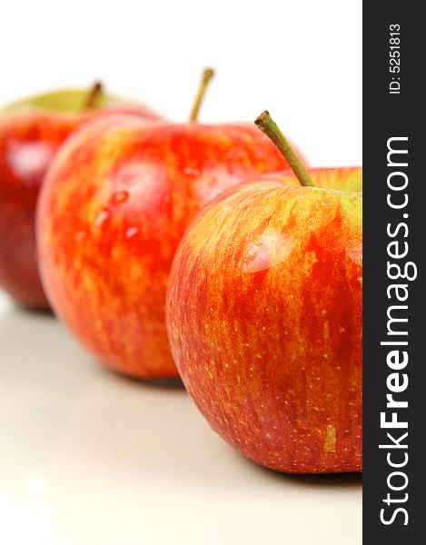 Red apples isolated against a white background