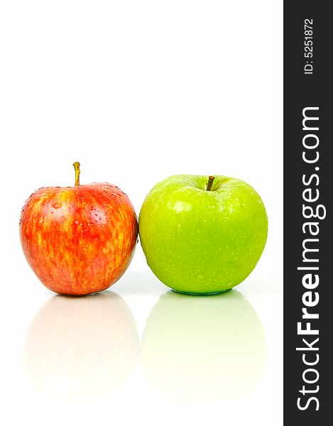 Red and green apples isolated against a white background. Red and green apples isolated against a white background