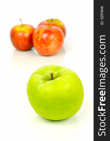 Red and green apples isolated against a white background. Red and green apples isolated against a white background