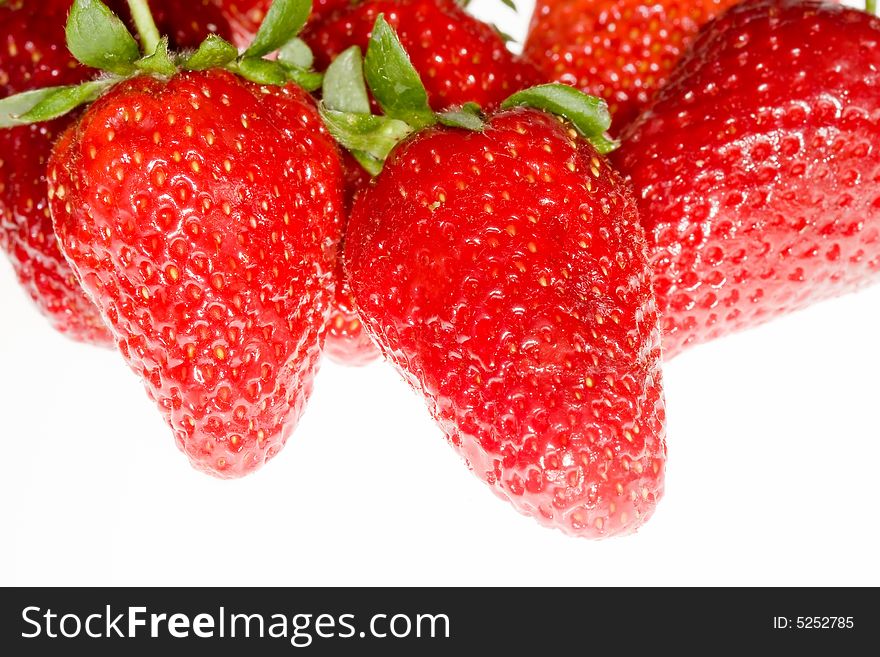 Delicious strawberries on white background. Delicious strawberries on white background