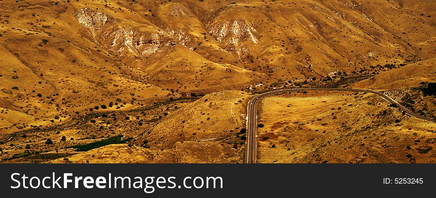 Beautiful panorama when the mountains are wearing a gold color. Beautiful panorama when the mountains are wearing a gold color