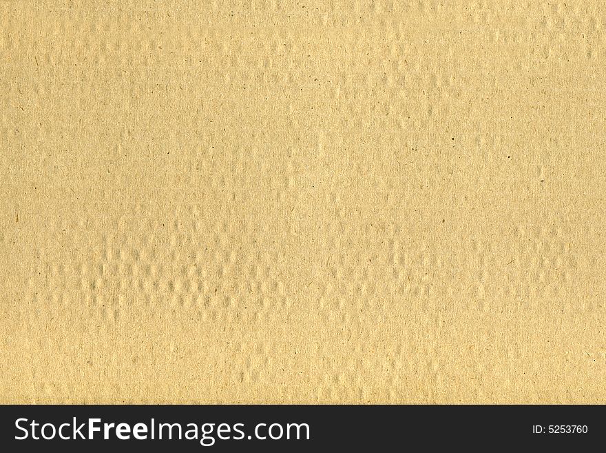 Closeup of a brown cardboard surface background
