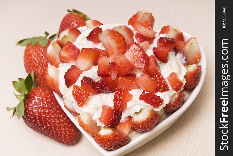 Dessert from a strawberry with a cream. Dessert from a strawberry with a cream.