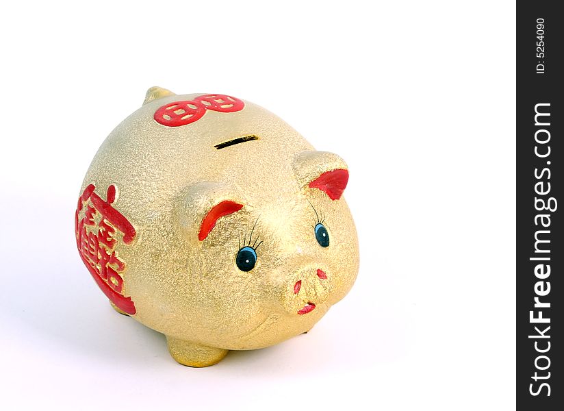 This is a golden piggybank,on white isolated background.